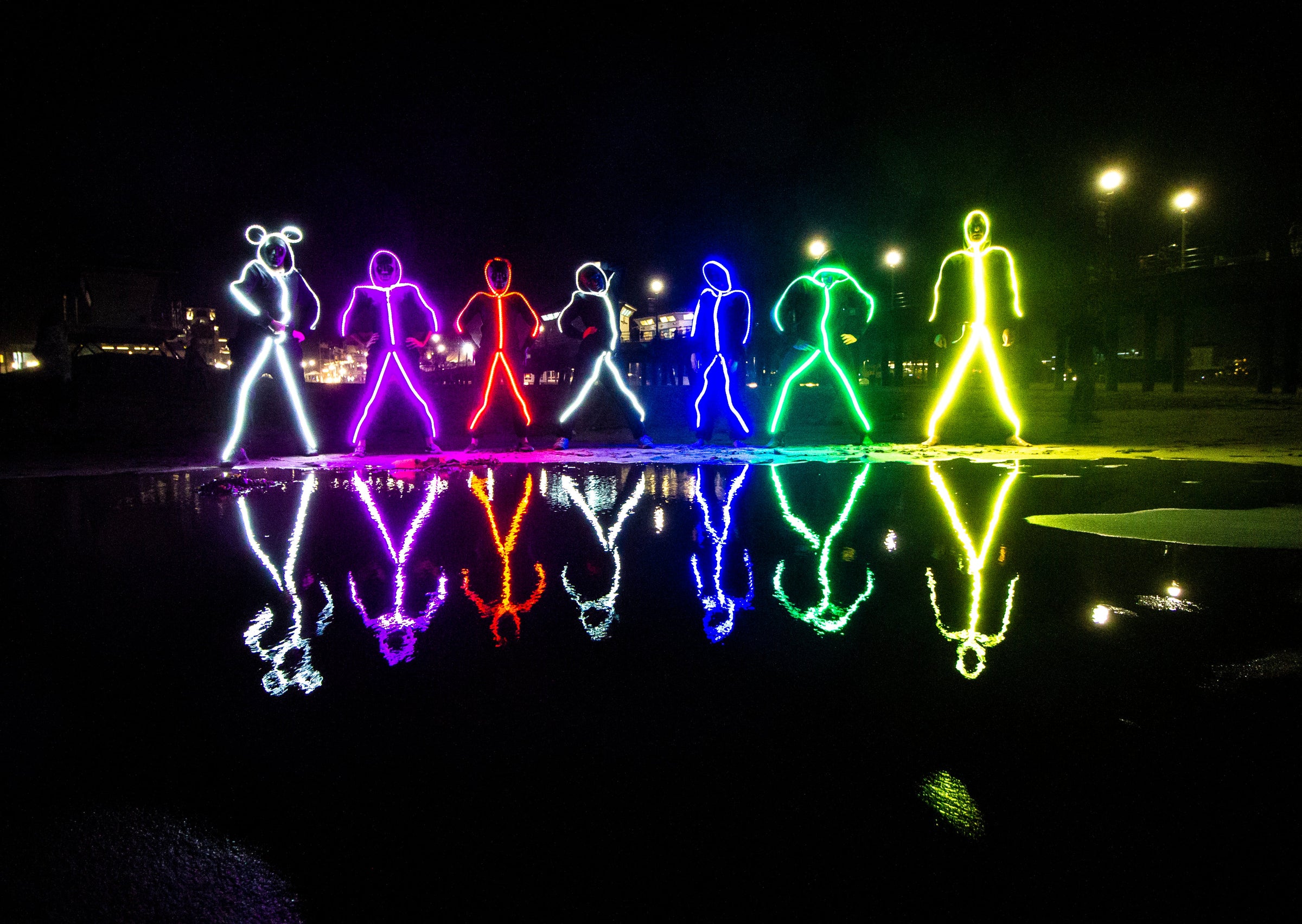 LED Stick Figures standing together in various colors