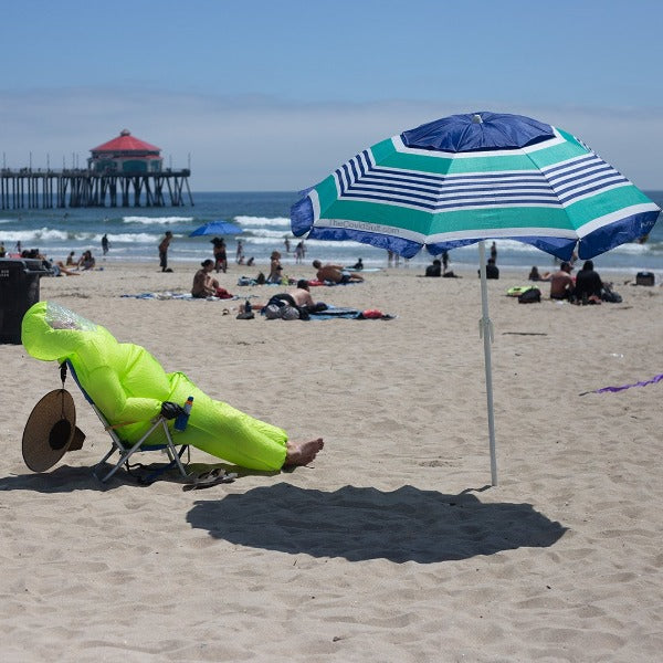 relaxing at the beach tanning those feet