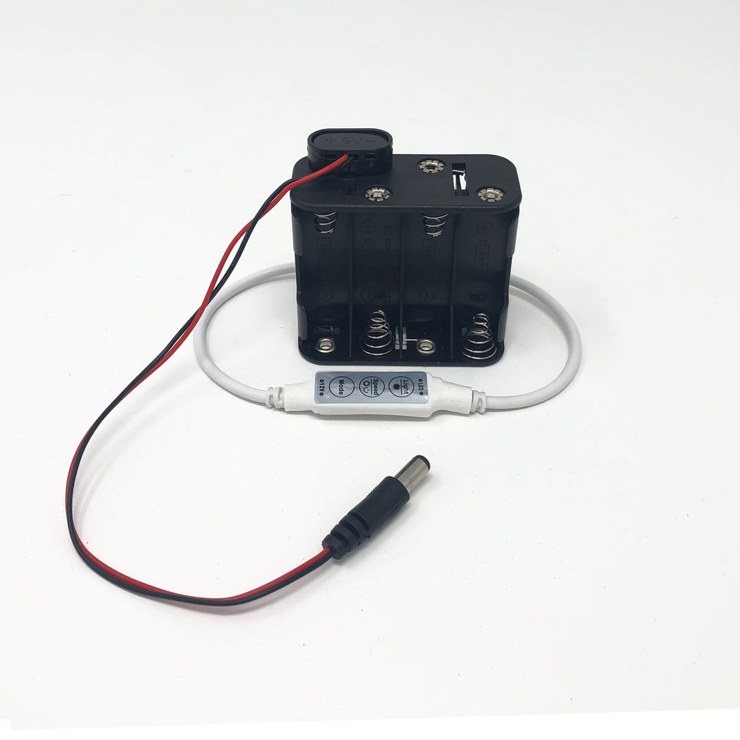 Battery holder and controller for LED Glasses